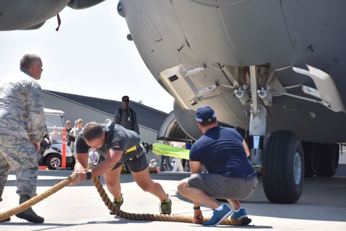 Here are Videos of Man Pulling a 416,299 lb C-17 Globemaster III Aircraft to make World record