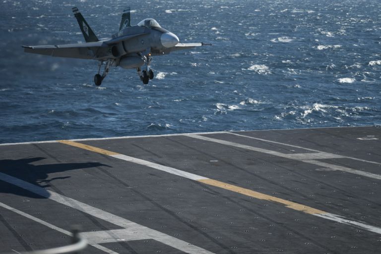 U.S. Navy Landed  F-18 Hornet Fighter Jet on Aircraft Carrier Via Remote Control