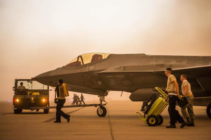 An F-35 is secured by personnel at Luke AFB.