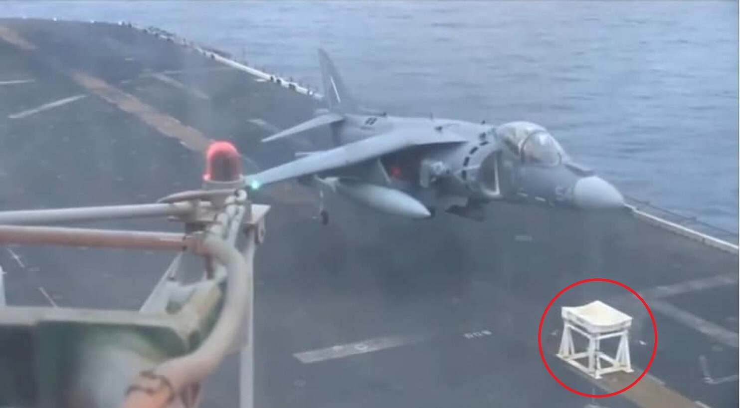 Video of AV-8B Harrier no nose gear vertical landing on padded stool