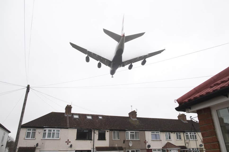 Body falls off Kenya Airways plane into London garden during landing at Heathrow airport