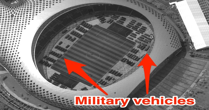 Satellite imagery Spotted hundreds of Chinese military vehicles at a soccer stadium near the Hong Kong border