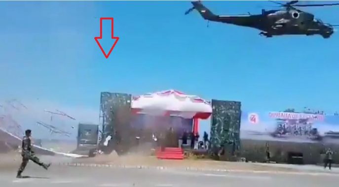 Indonesian Low Flying Mi-35P Helicopter Accidentally Blows Down VIP podium At Army Parade