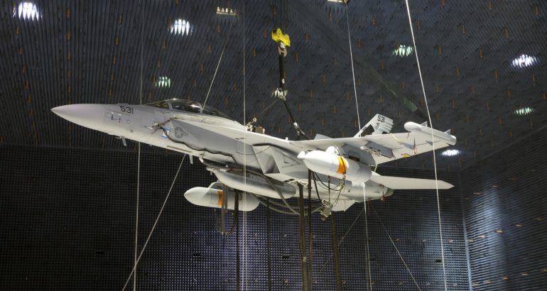 U.S. Navy Enginers Hoisted EA-18G Growler Fighter Jet For Testing Of Next Generation Jammer Pod