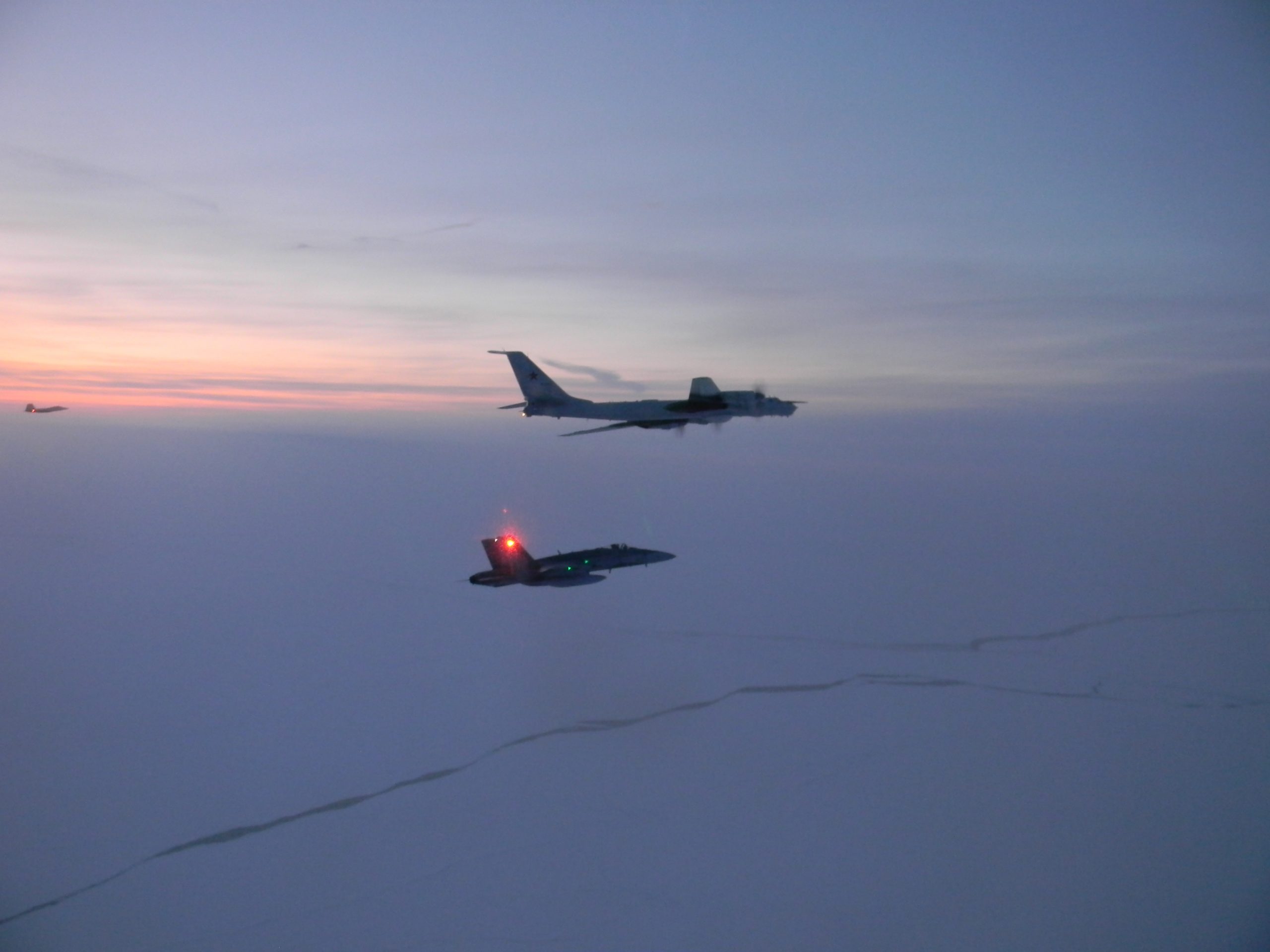 USAF F-22 Raptors & RCAF CF-18 Hornets Intercepted Two Russian Tu-142 Aircraft